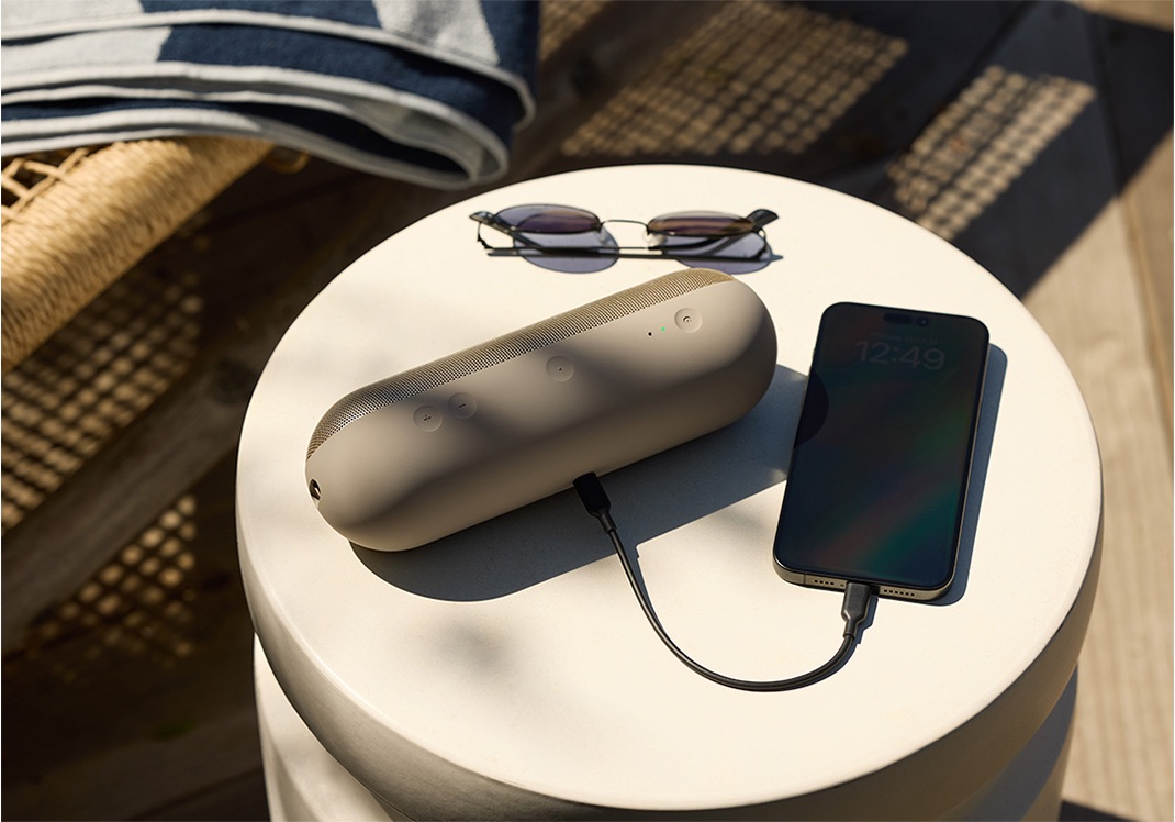 Beats Pill next to smartphone