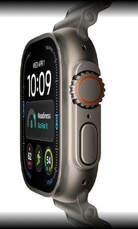 „Apple Watch Ultra 4“, titano korpusas, natūrali spalva, skaitmeninis ciferblatas, komplikacijos: pasirengimas, širdies ritmas, treniruotės, temperatūra, dešinė pusė iš išorės, „Digital Crown“, iškilęs šoninis mygtukas, permatomai pilkas „Ocean Band“ dirželis