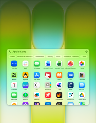 MacBook Neo ekranas su Applications langu, kuriame matoma daug įvairių programų